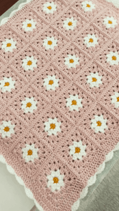 Immerse yourself in the exquisite beauty of our Blossom Harmony Crochet Blanket, a masterpiece of handcrafted floral elegance. Each petal and leaf intricately woven with care, this blanket is more than a cozy companion—it's a celebration of nature's beauty in every stitch.