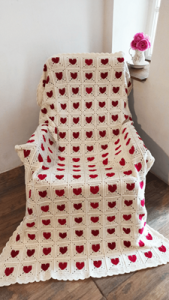 Heart Crochet Blanket - Fall in love with this handmade crochet blanket featuring a beautiful heart motif design. Crafted with care and attention to detail, this cosy blanket is a symbol of warmth, comfort, and love. The crochet stitches form a pattern of heart, creating a stunning visual representation of affection and tenderness. Wrap yourself or a loved one in the heartfelt embrace of this charming crochet creation. Perfect for snuggling up and adding a touch of love to any space. Handmade with care, spreading love one stitch at a time.