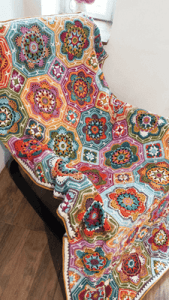Persian Tile Crochet Blanket' - A stunning handmade crochet blanket inspired by the intricate patterns and vibrant colors of Persian tiles. This cozy blanket features a mesmerizing array of geometric motifs and rich hues, blending tradition and contemporary style. Perfect for adding warmth and a touch of cultural elegance to any space. Crafted with love and attention to detail. Get wrapped in the beauty of this Persian-inspired crochet masterpiece.
