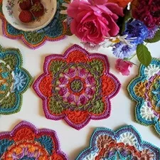 Description: Immerse your space in a burst of color with our Vibrant Crochet Mandala. This mesmerizing, handmade piece is a celebration of hues. Elevate your decor with this unique crochet mandala, meticulously crafted to radiate positive energy and artistic charm. Transform your surroundings with this burst of color and creativity, bringing joy and vibrancy to your home.