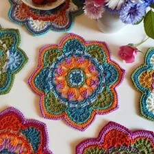 Description: Immerse your space in a burst of color with our Vibrant Crochet Mandala. This mesmerizing, handmade piece is a celebration of hues. Elevate your decor with this unique crochet mandala, meticulously crafted to radiate positive energy and artistic charm. Transform your surroundings with this burst of color and creativity, bringing joy and vibrancy to your home.