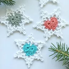Elevate your holiday decor with our Crochet Snowflake Pattern. Craft delicate, snow-kissed wonders for a winter wonderland at home. Perfect for adorning trees or enhancing festive displays, this beginner-friendly pattern ensures a joyful crafting experience. Customize with various yarns for unique, handcrafted treasures. Bring the magic of crochet to your holiday celebrations and surprise loved ones with timeless, seasonal charm. Download our pattern now and infuse your space with the enchantment of handmade elegance.